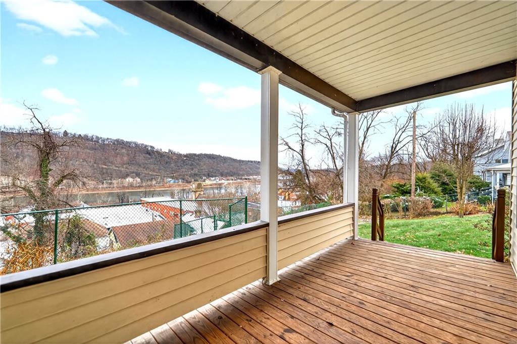 136 1/2 Chess Street Monongahela, PA 15063 - Photo 37 of 50 a view of roof deck with wooden floor and fence next to a yard