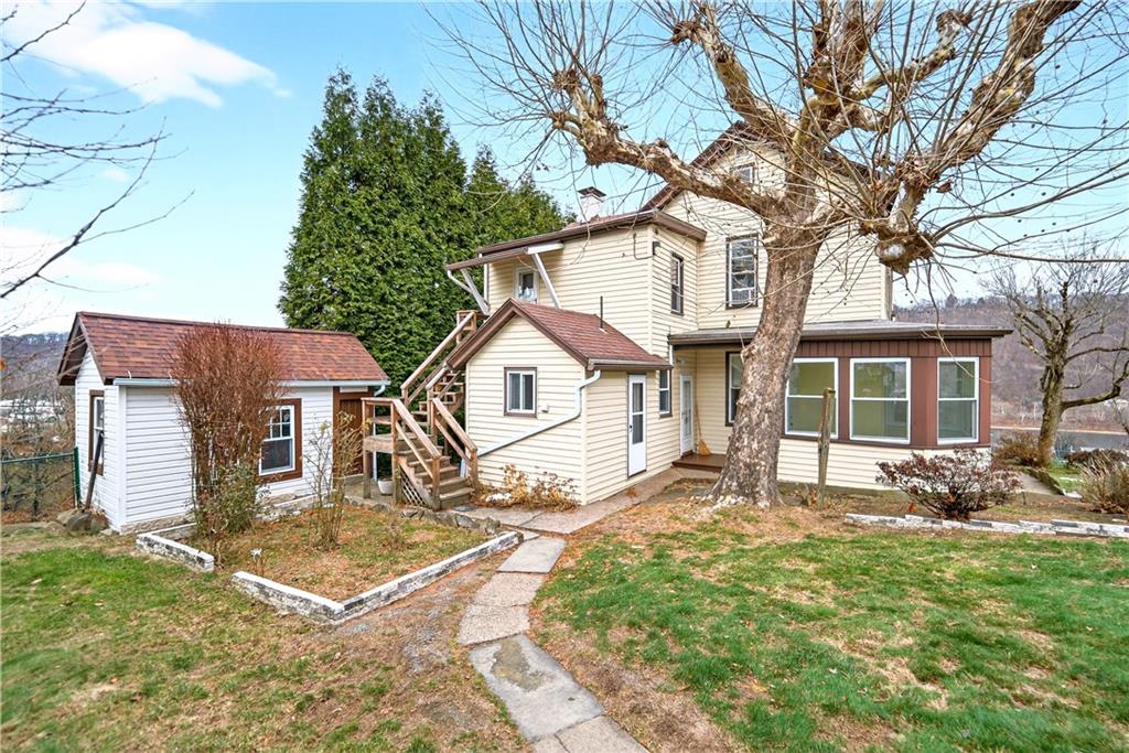 136 1/2 Chess Street Monongahela, PA 15063 - Photo 48 of 50 a front view of a house with a yard