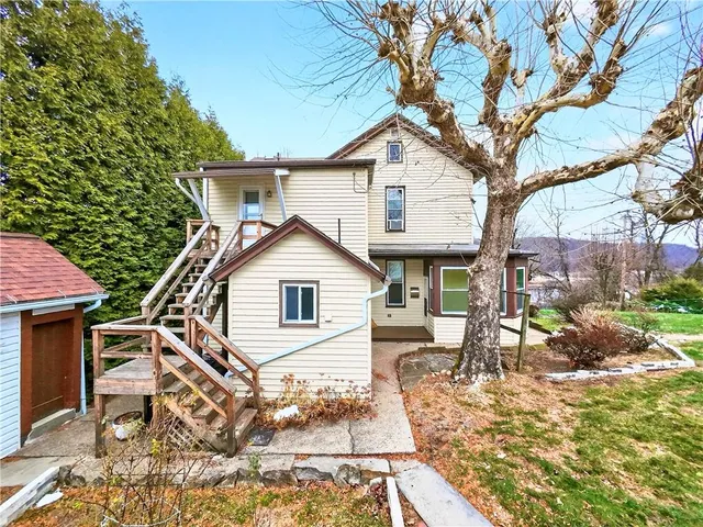 a view of a house with a patio