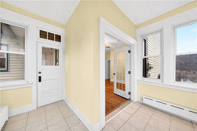 a view of a living room with a large window