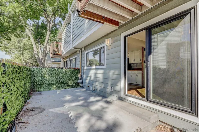 a view of a door and a window