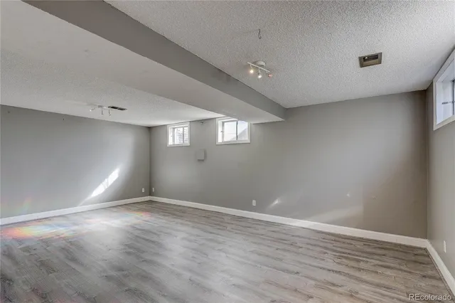 a utility room with sink washer and dryer