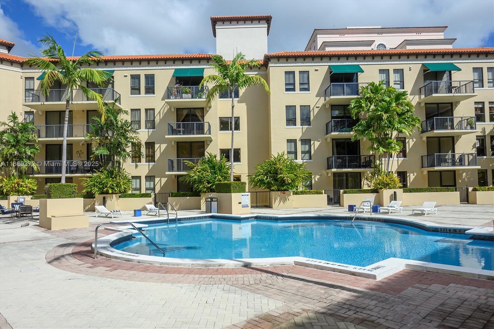 55 Merrick Way, Unit 814 Coral Gables, FL 33134 - Photo 21 of 39 a view of building with outdoor space