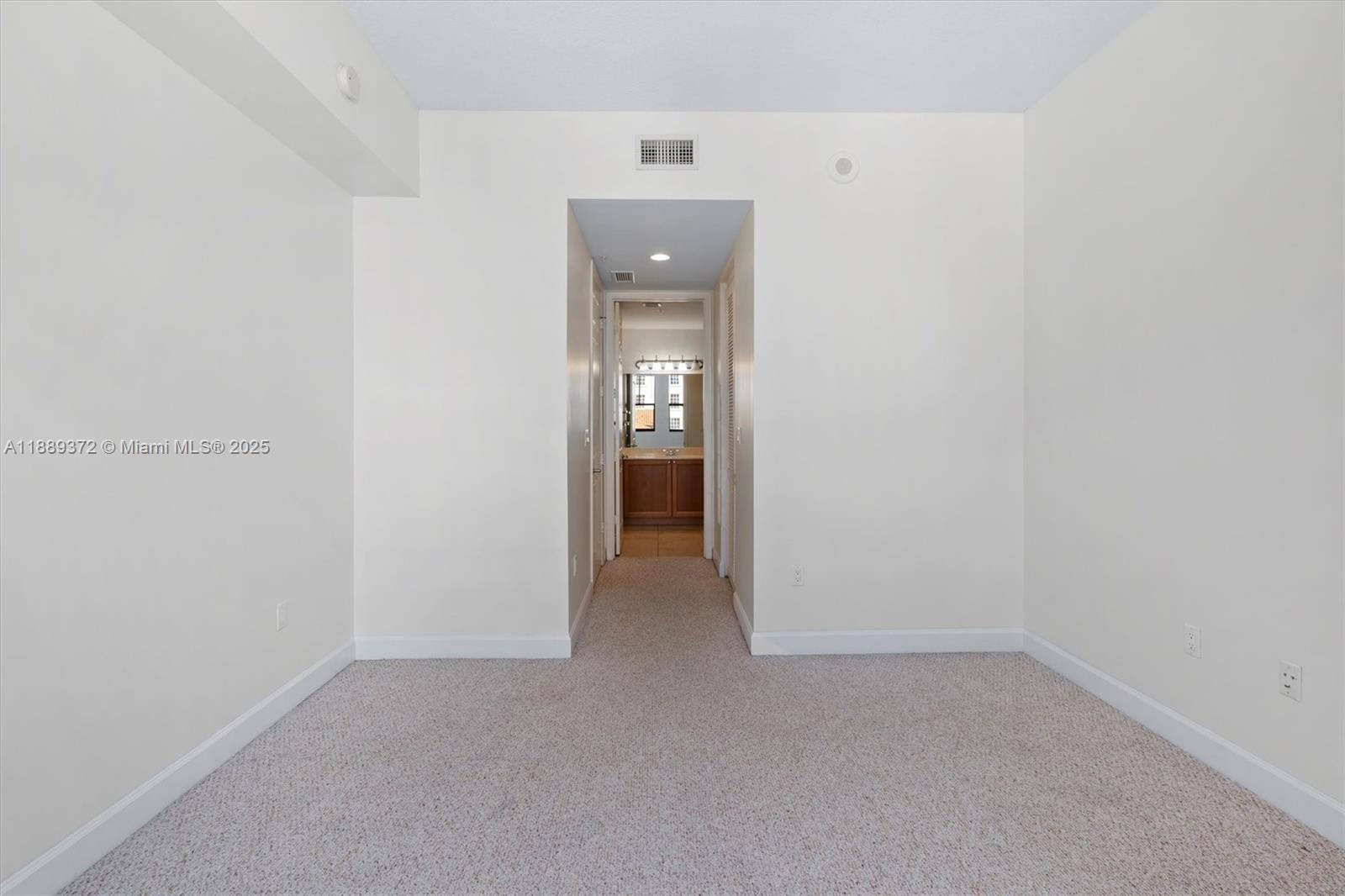 55 Merrick Way, Unit 814 Coral Gables, FL 33134 - Photo 25 of 39 a view of an empty room and closet
