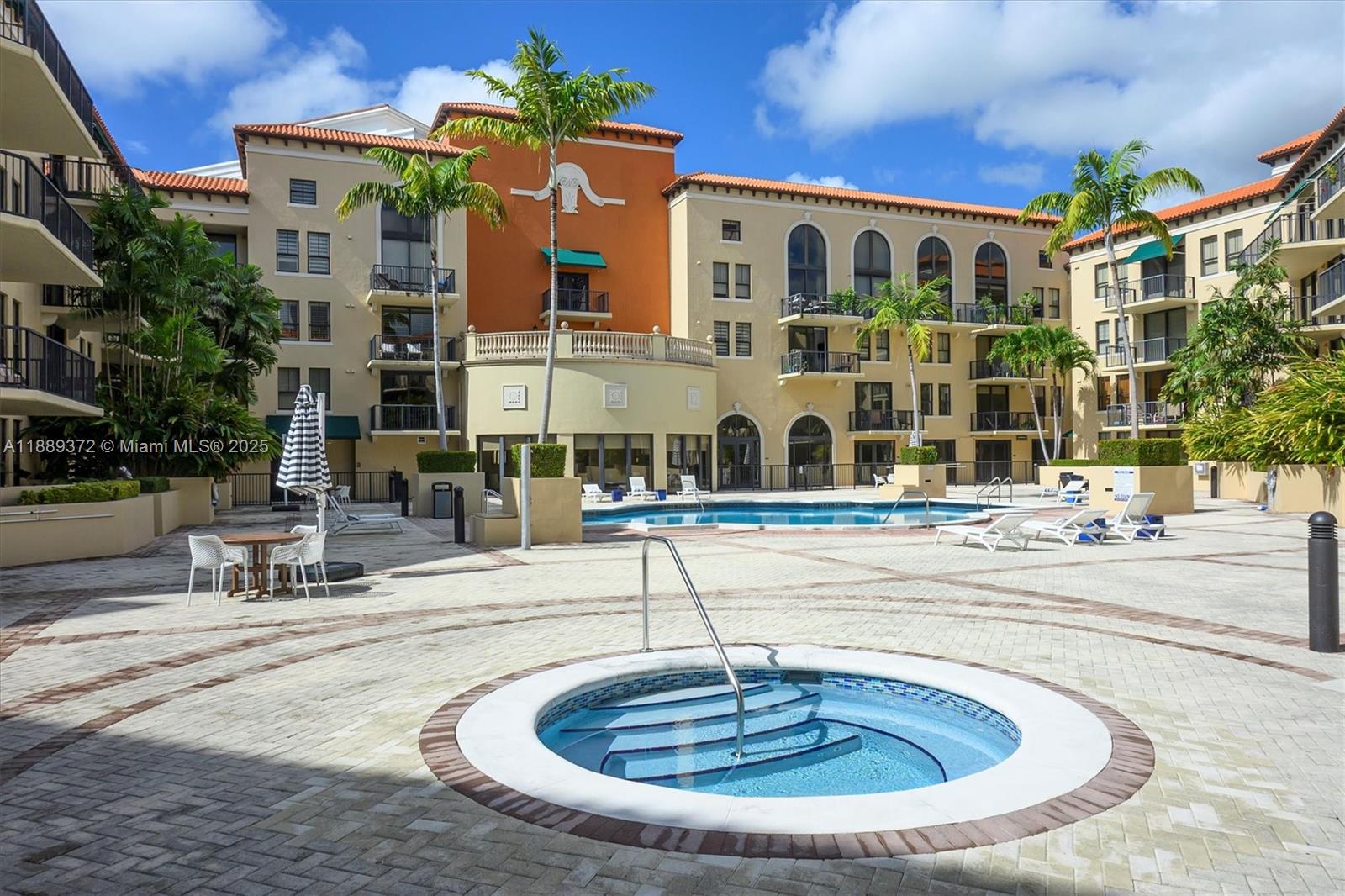 55 Merrick Way, Unit 814 Coral Gables, FL 33134 - Photo 37 of 39 a view of building with outdoor space