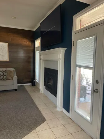 a view of a livingroom with a fireplace