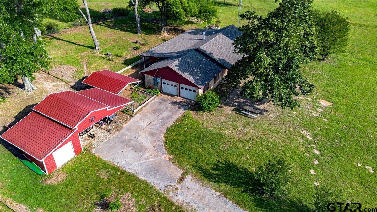8192 County Road 428 Tyler, TX 75704 - Photo 5 of 38 an aerial view of a house with garden
