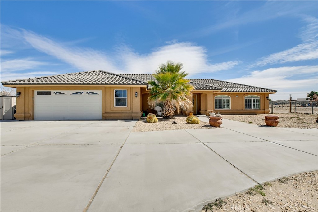 13375 Johnson Road Phelan, CA 92371 - Photo 1 of 1 a very nice looking house with a large window