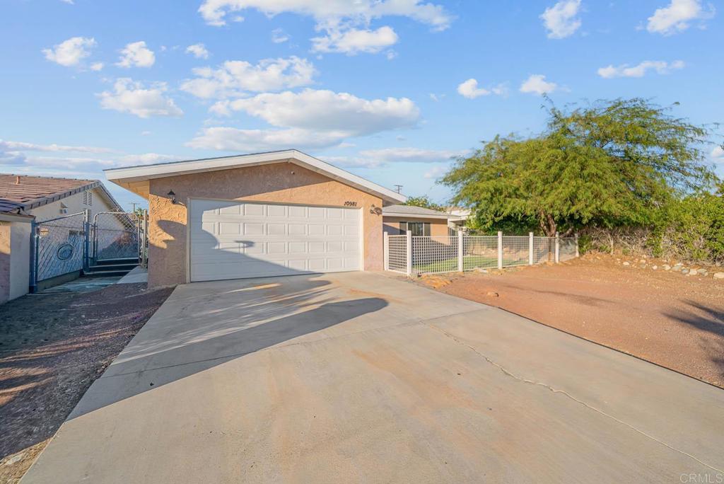 10981 Santa Cruz Road Desert Hot Springs, CA 92240 - Photo 24 of 43 a view of a house with a patio