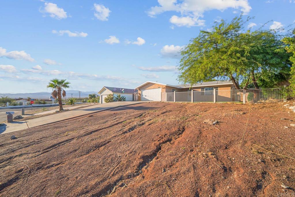 10981 Santa Cruz Road Desert Hot Springs, CA 92240 - Photo 32 of 43 a house view with a outdoor space