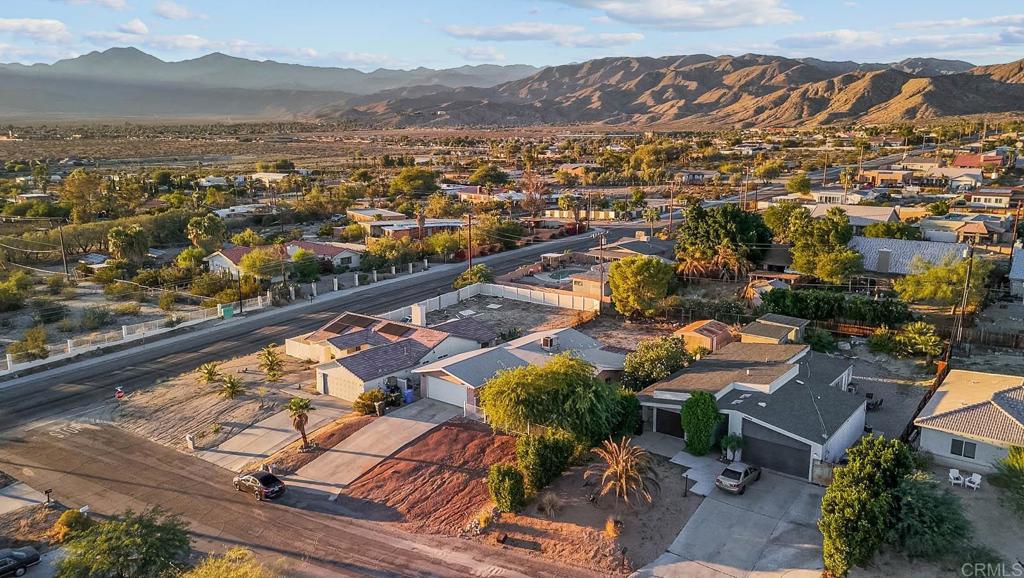 10981 Santa Cruz Road Desert Hot Springs, CA 92240 - Photo 37 of 43 an aerial view of residential houses with outdoor space