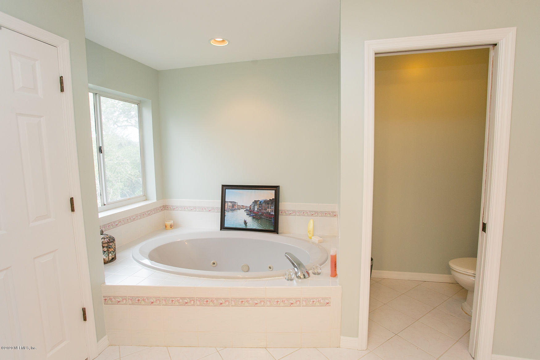6317 Salado Road St. Augustine, FL 32080 - Photo 34 of 51 a bathroom with a tub sink and toilet