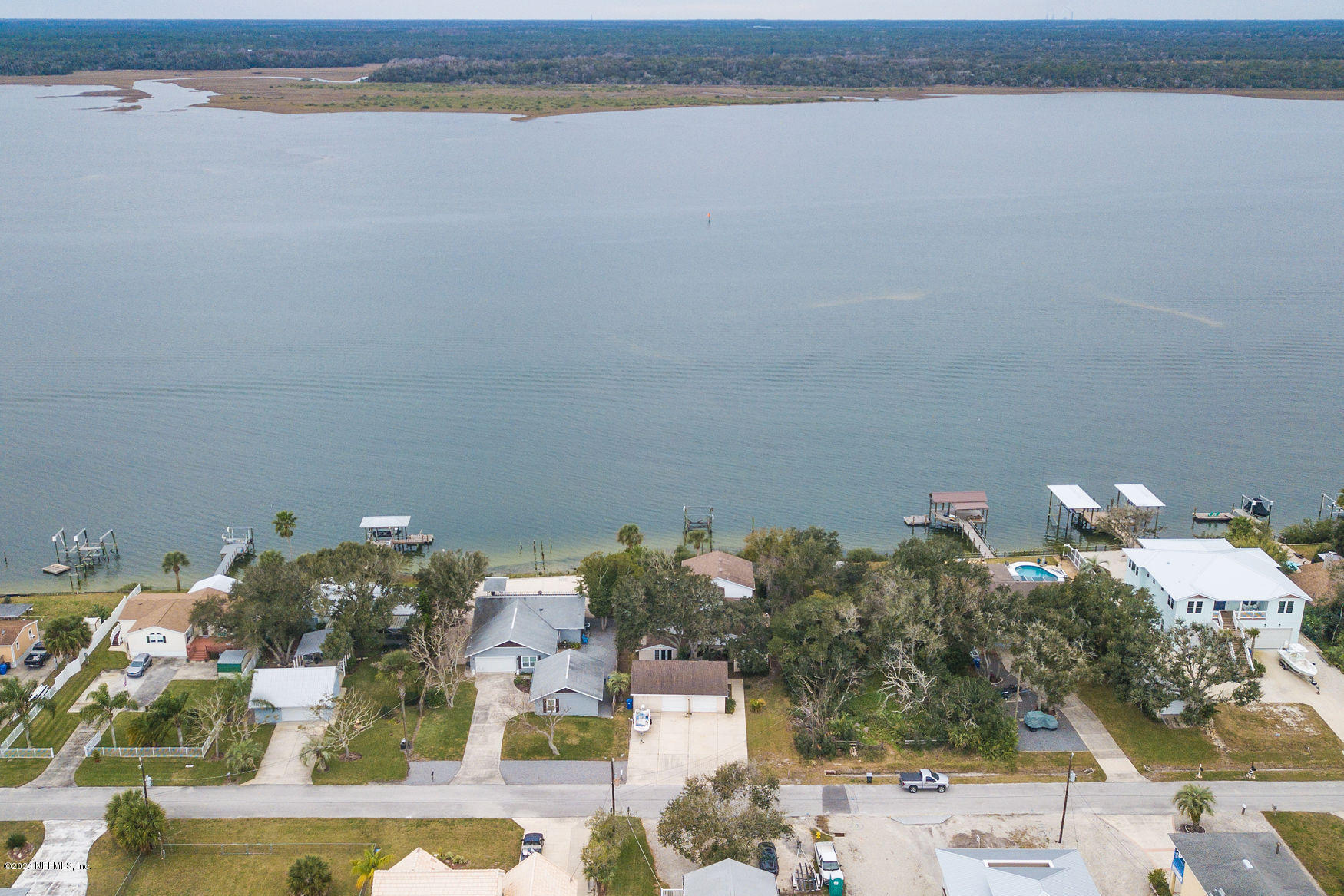 6317 Salado Road St. Augustine, FL 32080 - Photo 51 of 51 an aerial view of a house with a lake view