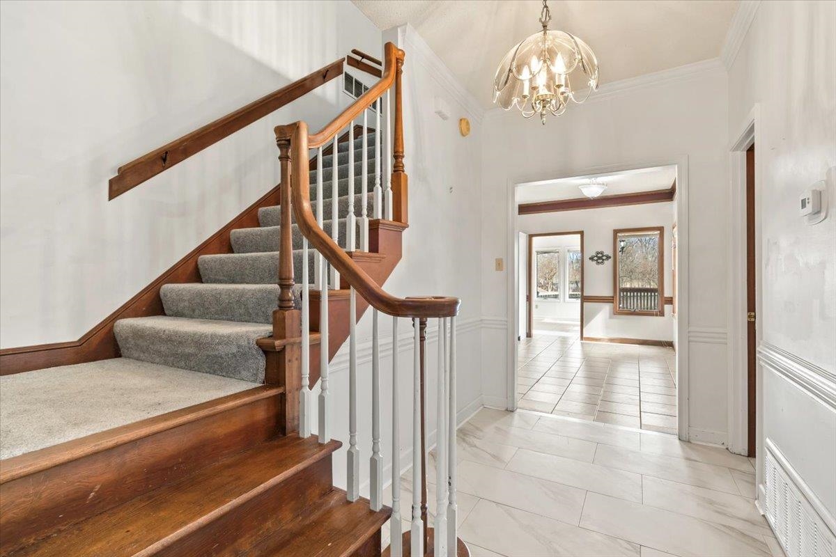 4590 Whiteoaks Lane Bartlett, TN 38002 - Photo 11 of 40 a view of entryway and hall with wooden floor