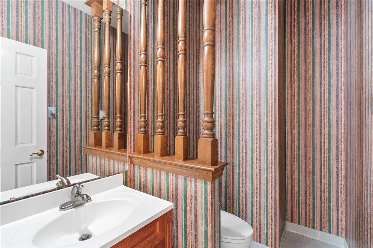 4590 Whiteoaks Lane Bartlett, TN 38002 - Photo 23 of 40 a bathroom with a sink and a mirror