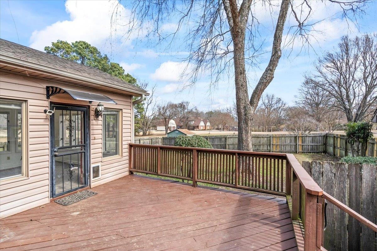 4590 Whiteoaks Lane Bartlett, TN 38002 - Photo 32 of 40 a view of a balcony with wooden floor and fence