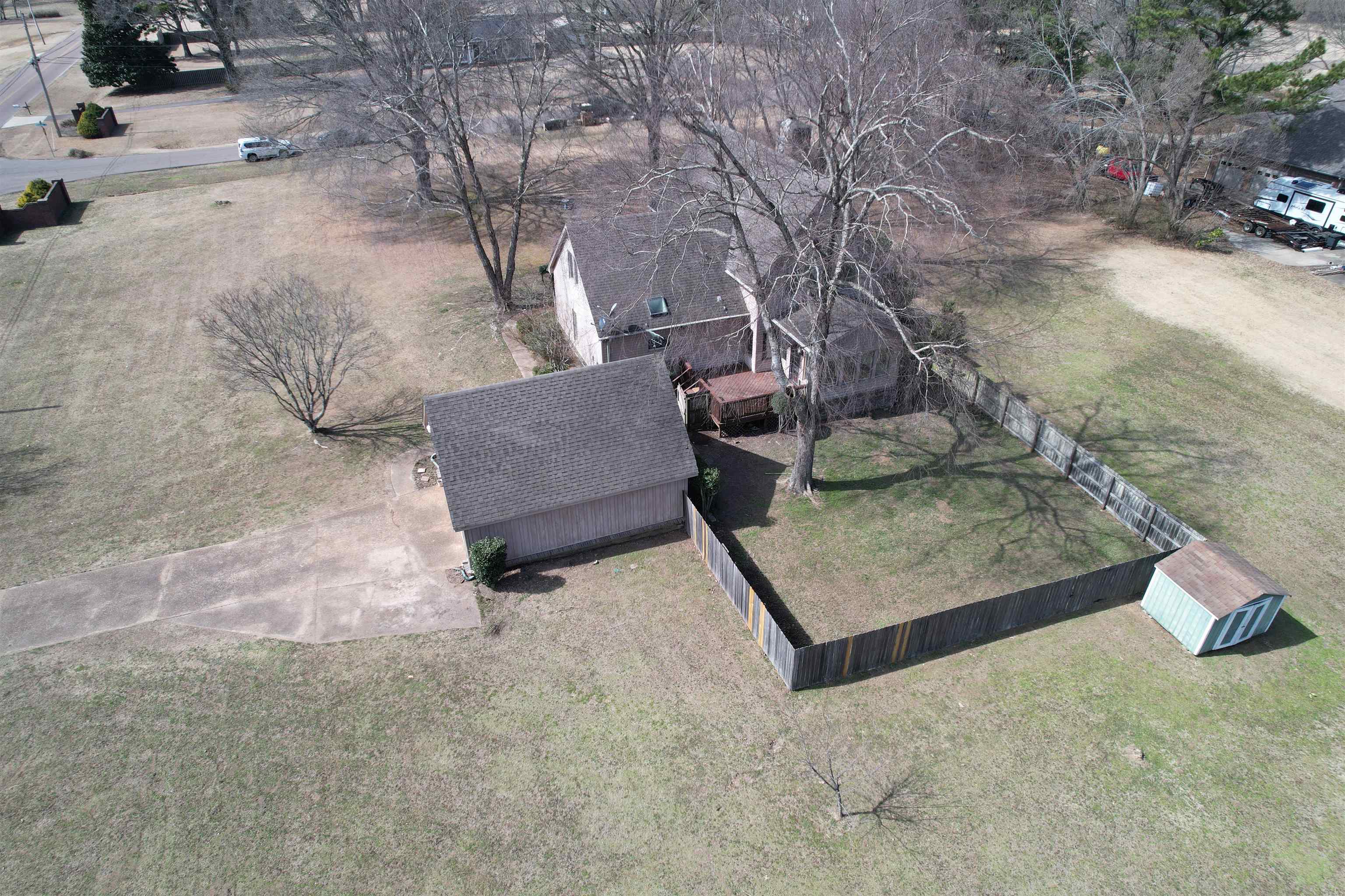 4590 Whiteoaks Lane Bartlett, TN 38002 - Photo 5 of 40 a view of a yard with an outdoor space