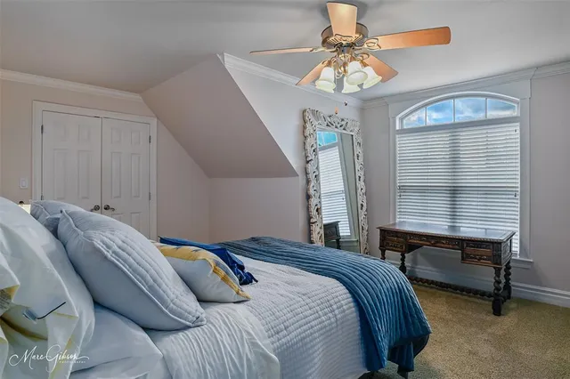 a reading room with furniture and a lamp