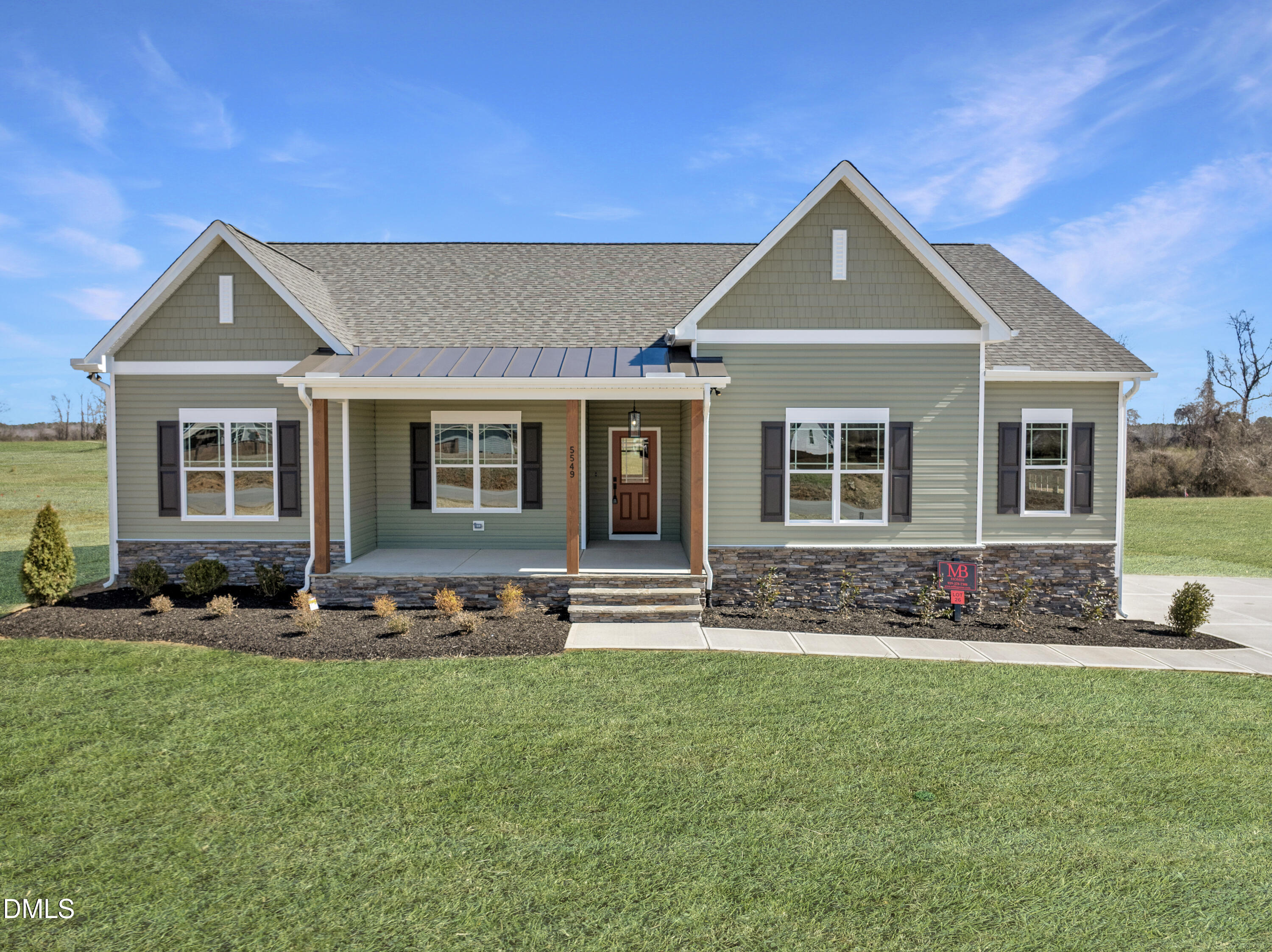 5549 River Buck Rd Spring Spring Hope, NC 27882 - Photo 1 of 35 a front view of a house with a yard