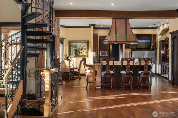a view of a lobby with furniture and dining room