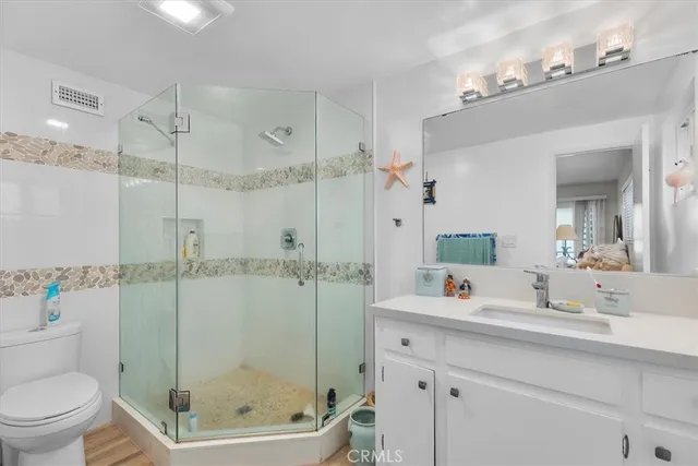 a balcony with table and chairs