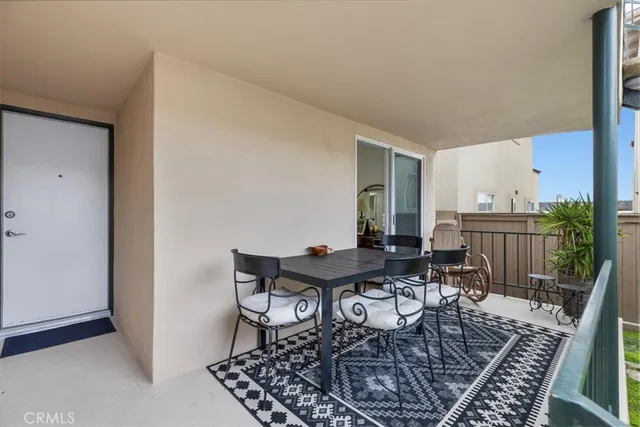 a bedroom with a bed and a desk