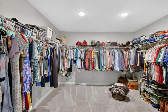 a bathroom with a sink vanity granite and a mirror