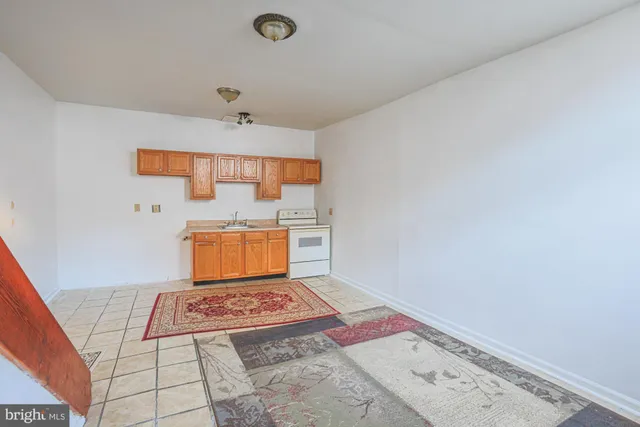 a view of a livingroom with wooden floor