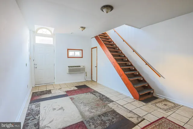 a white refrigerator freezer sitting inside of a kitchen