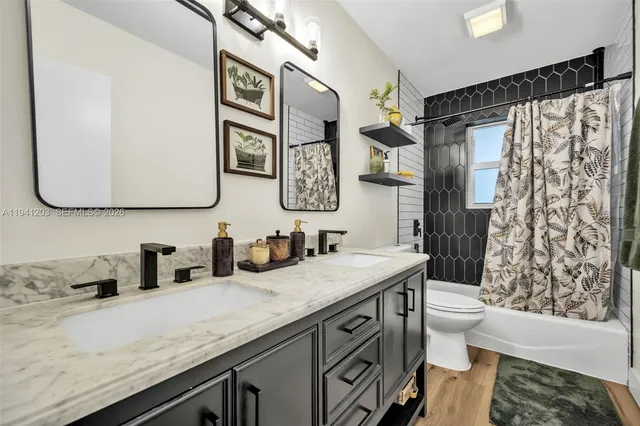 a view of a chairs and table in the patio