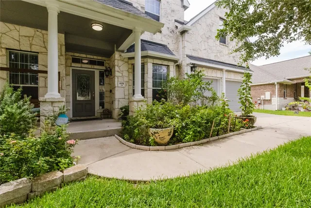 a view of a garden with pathway