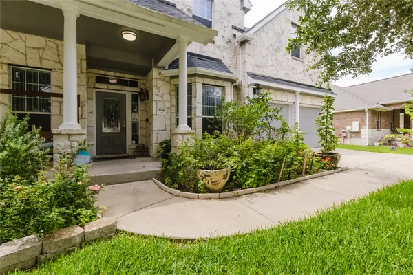 a view of a garden with pathway