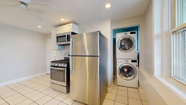a view of kitchen with washer and dryer