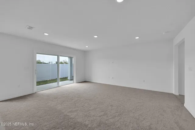 a view with a sink and mirror