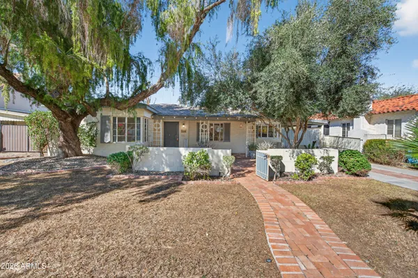 front view of a house with a small yard