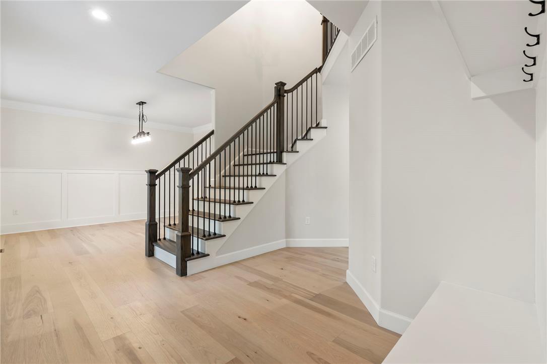 Hottle Road Quakertown, PA 18951 - Photo 7 of 59 An elegant staircase with dark wood treads and wrought iron spindles anchors the open foyer.