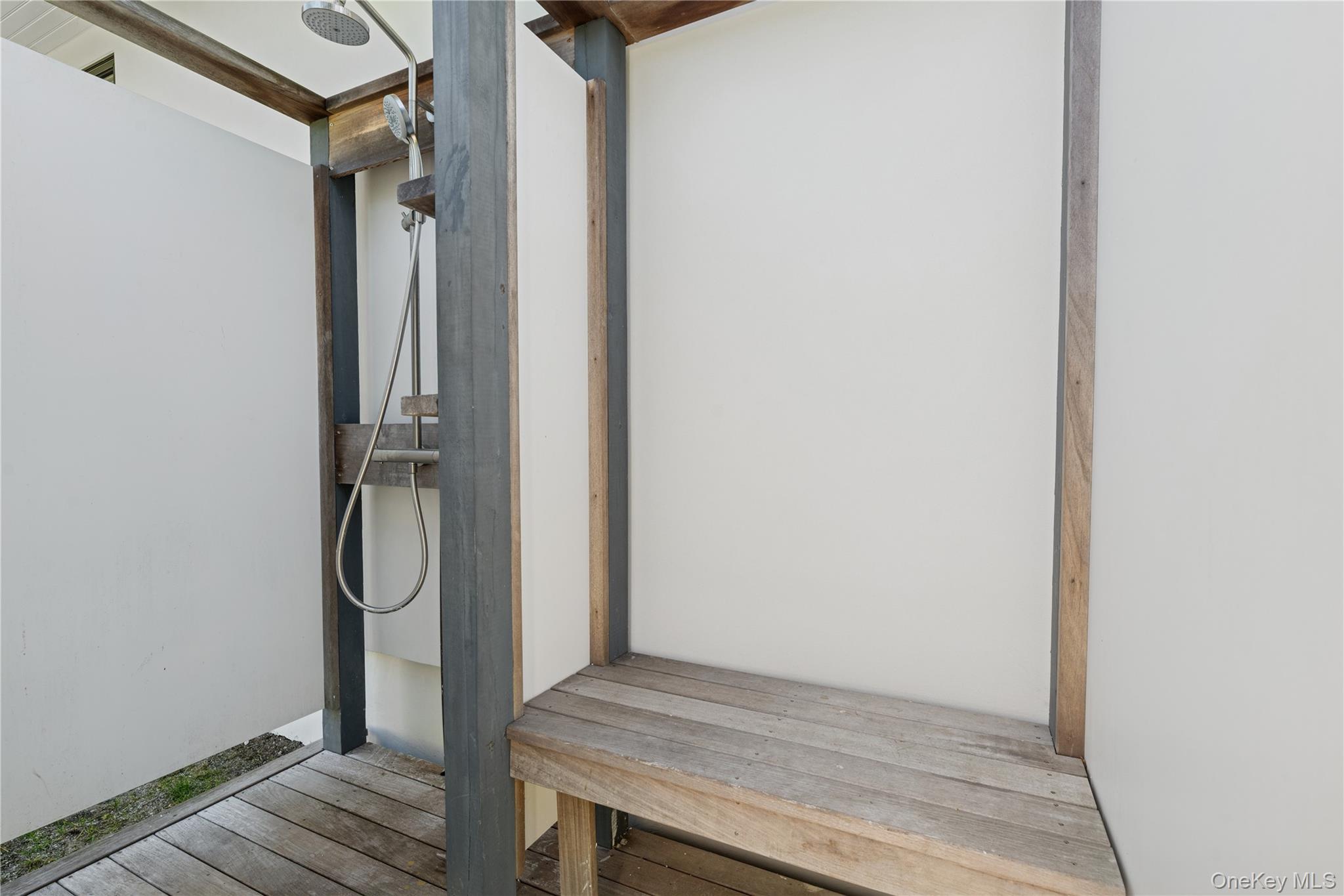 13 Sherwood Road Hampton Bays, NY 11946 - Photo 27 of 27 a view of storage and utility room with wooden floor