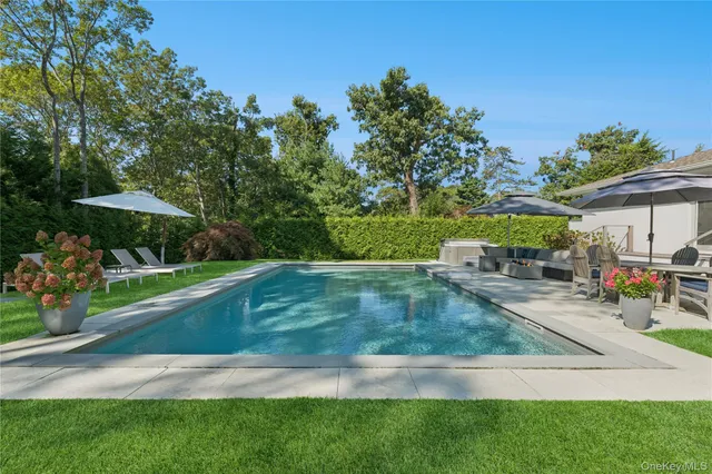 a view of a backyard with a patio