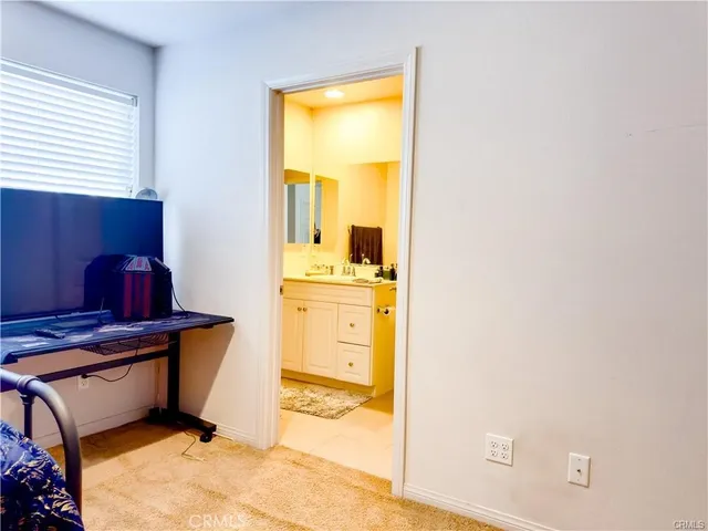 a view of walk in closet with window