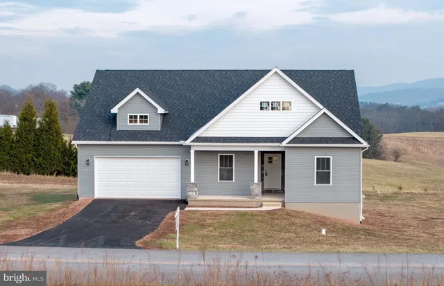 a view of a house with garage