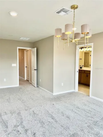 a view of a kitchen with a sink