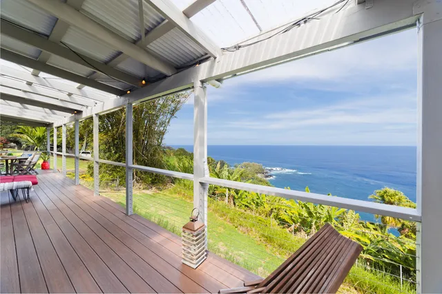 a view of swimming pool with seating area