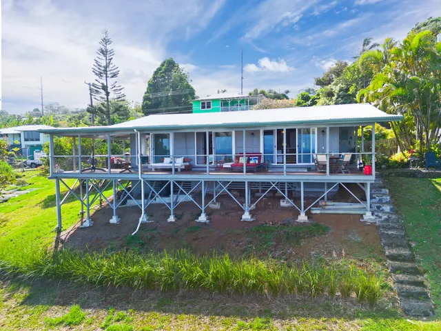 an aerial view of a house with a garden