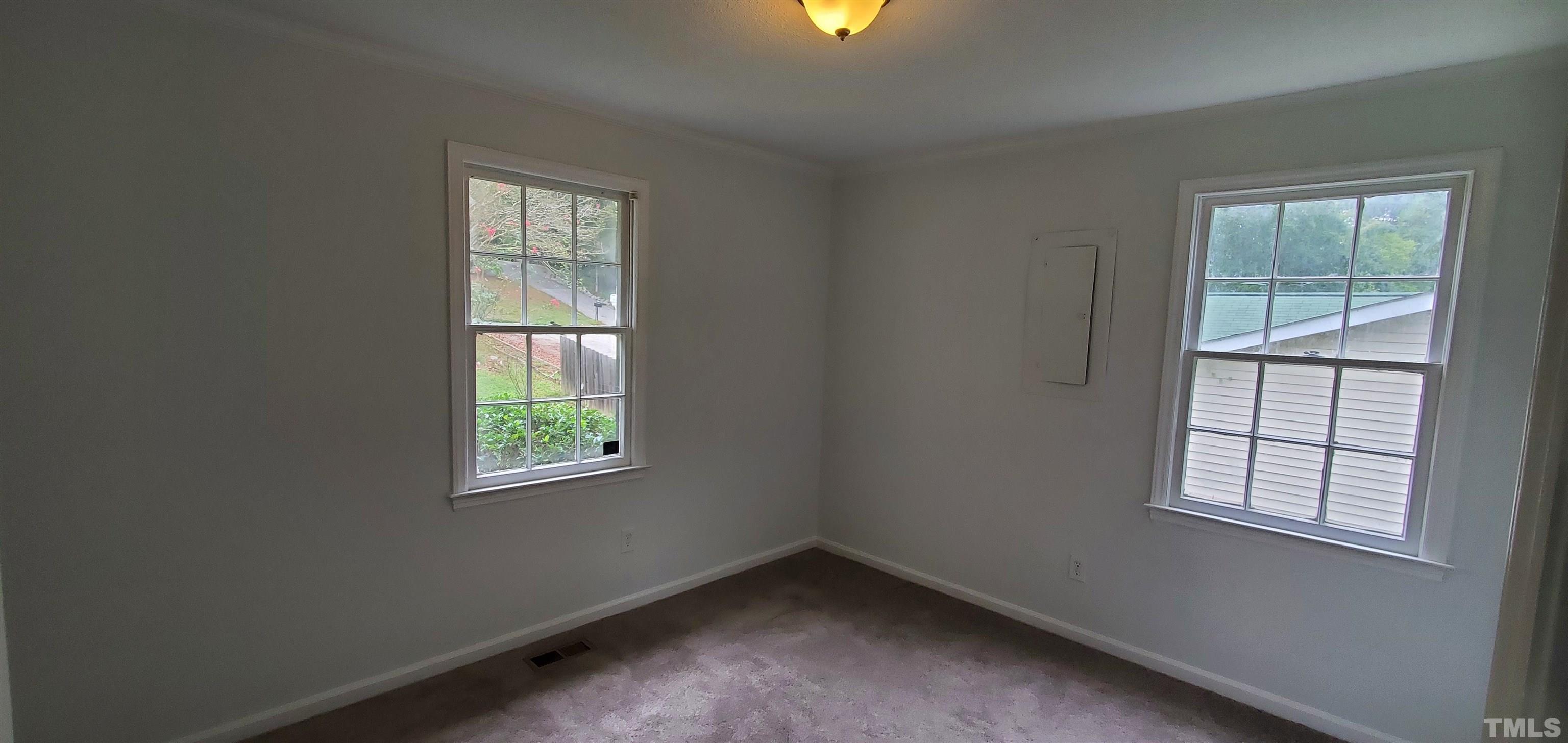 3817 Corwin Road Garner, NC 27529 - Photo 12 of 21 an empty room with windows