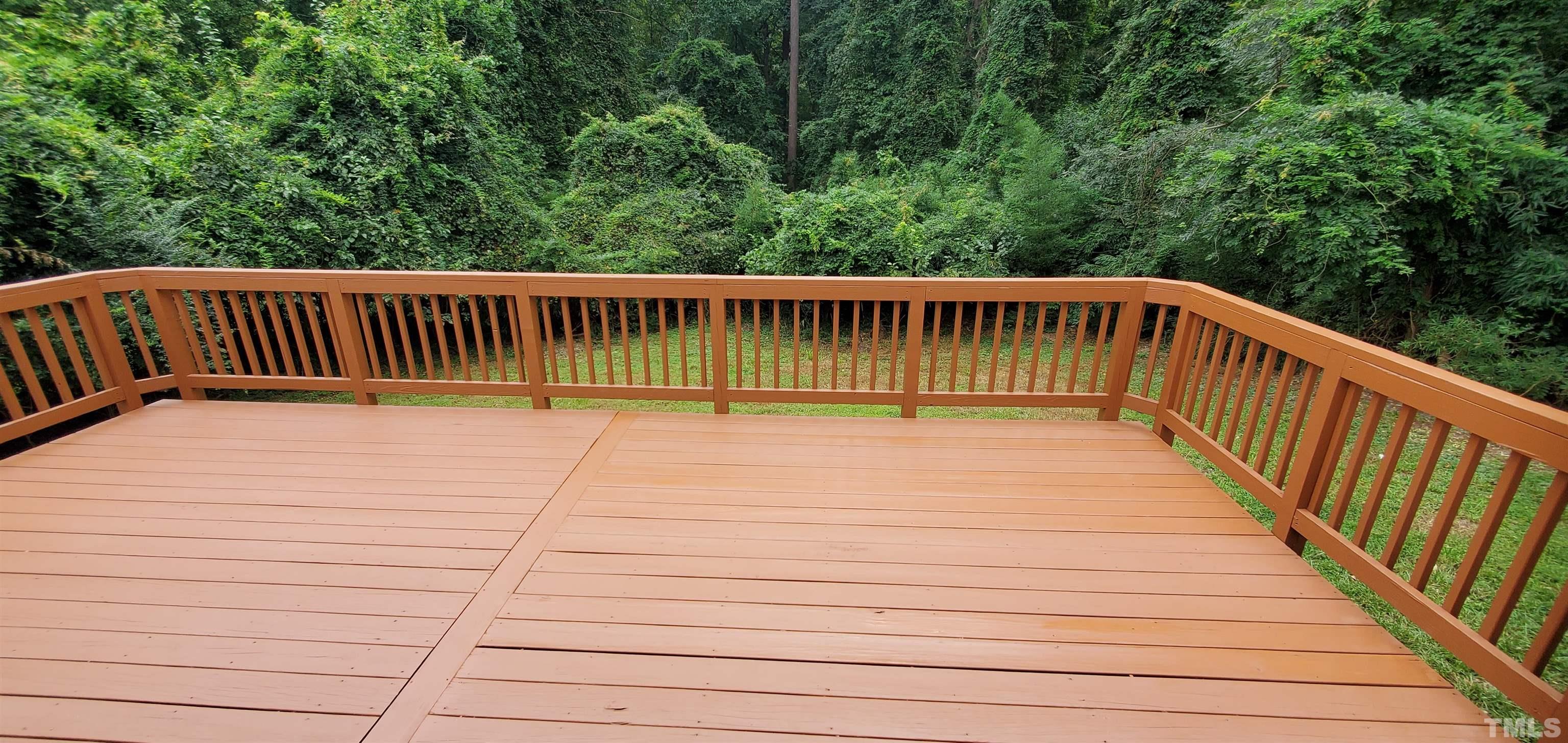3817 Corwin Road Garner, NC 27529 - Photo 18 of 21 a balcony with trees in the background