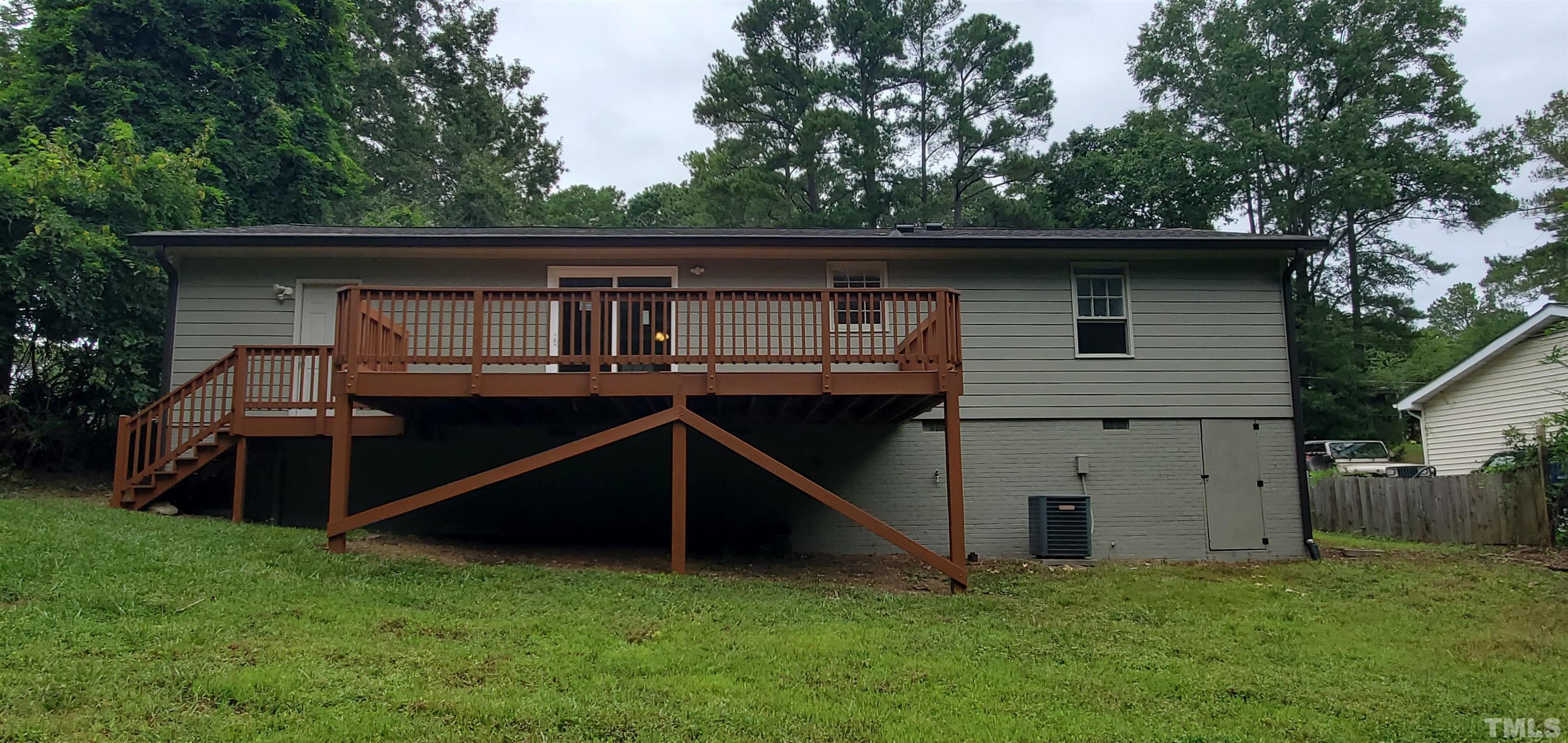 3817 Corwin Road Garner, NC 27529 - Photo 20 of 21 a view of a house with a backyard