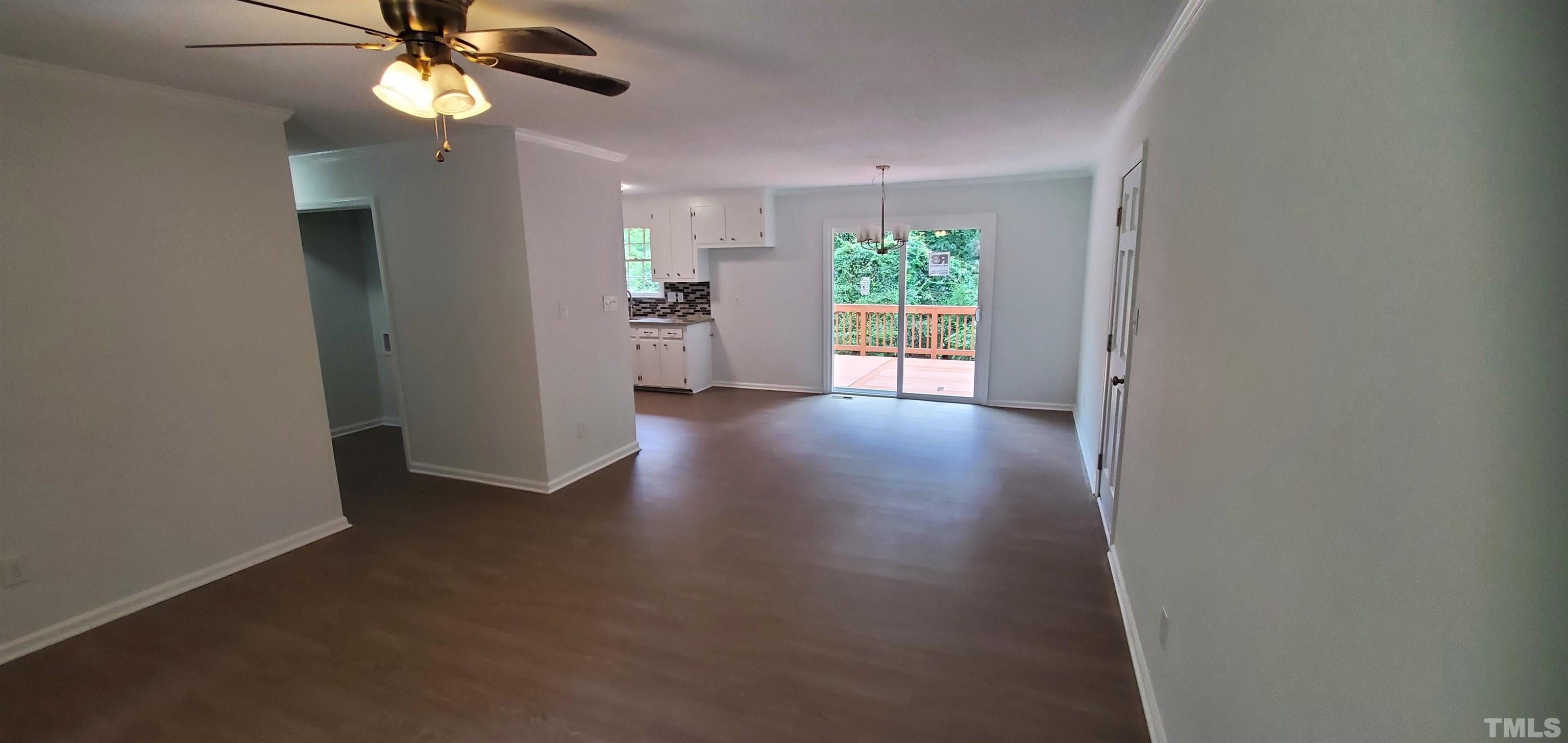 3817 Corwin Road Garner, NC 27529 - Photo 3 of 21 wooden floor in an empty room with a window