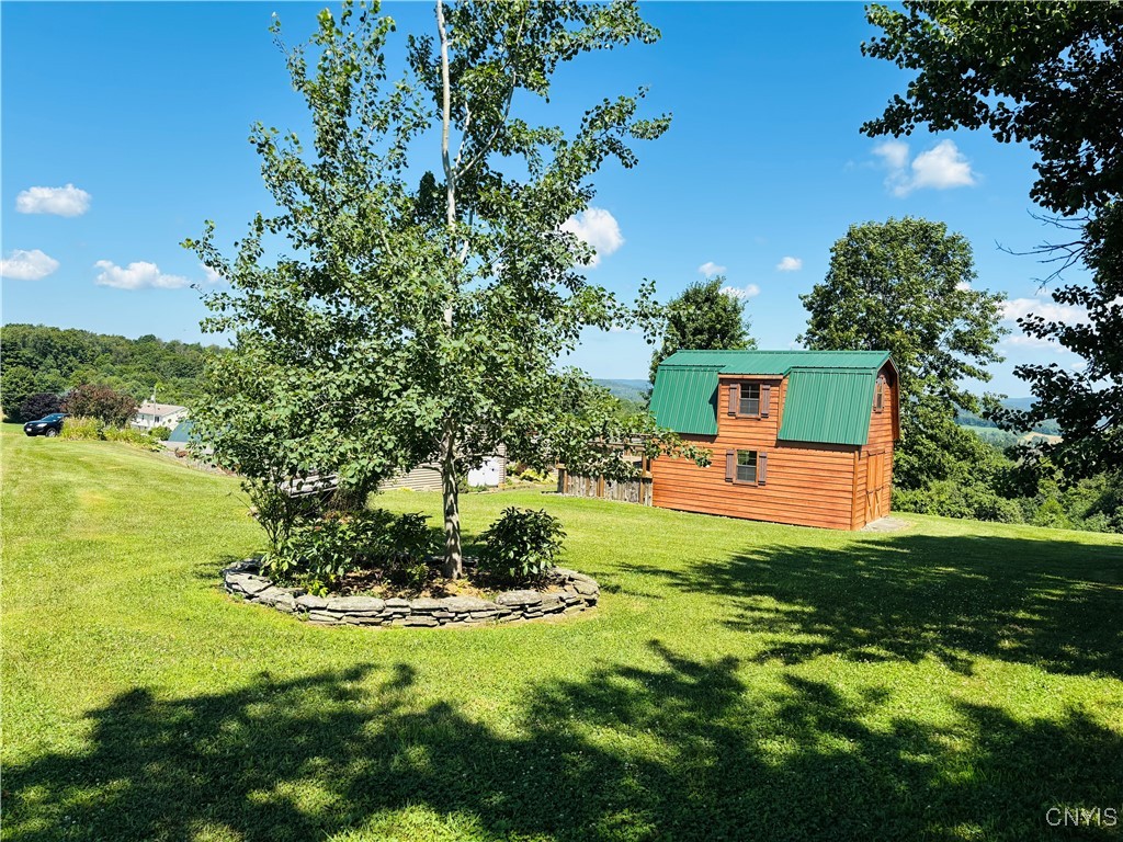 3228 Zelsnack Road Marathon, NY 13803 - Photo 34 of 50 Lots of green space with 2 story log building