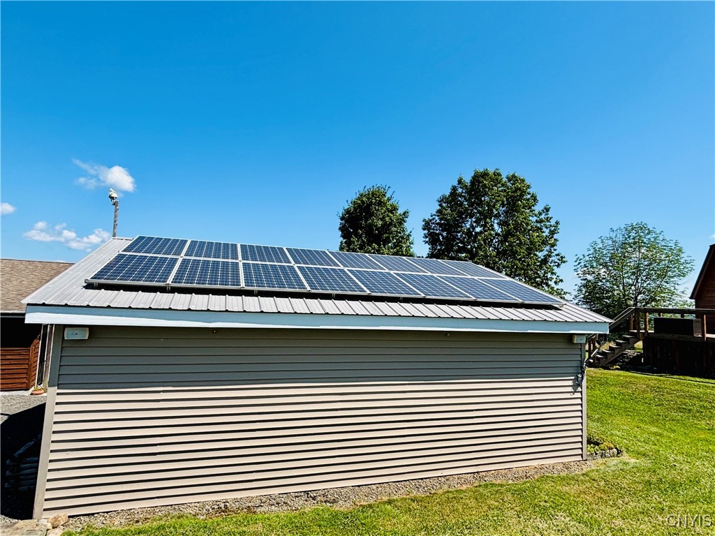 3228 Zelsnack Road Marathon, NY 13803 - Photo 41 of 50 Solar panels on garage for energy savings