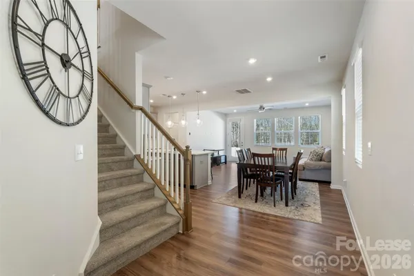 a view of a dining room with furniture window and outdoor view